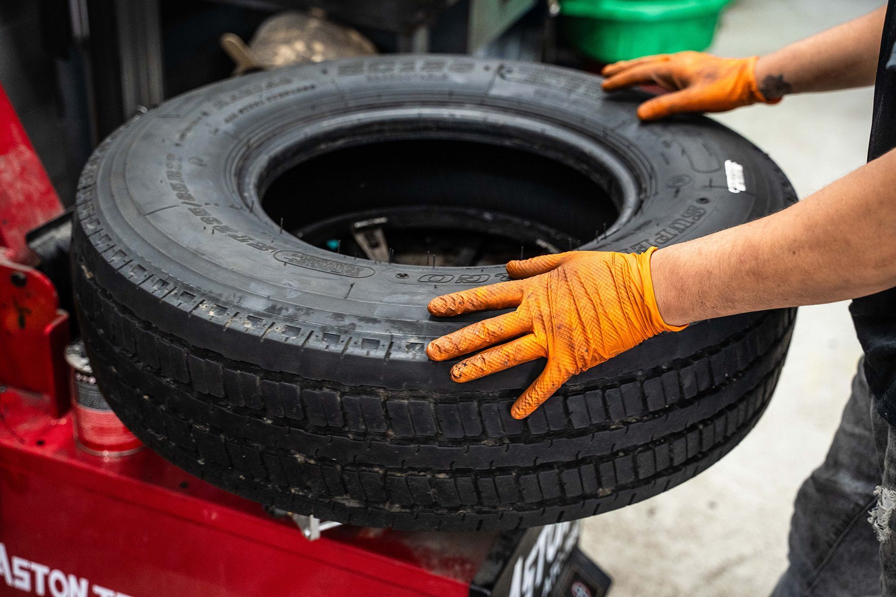 Working on Tire inside our Garage in Fishkill, NY | Jimmy's Auto Outlet