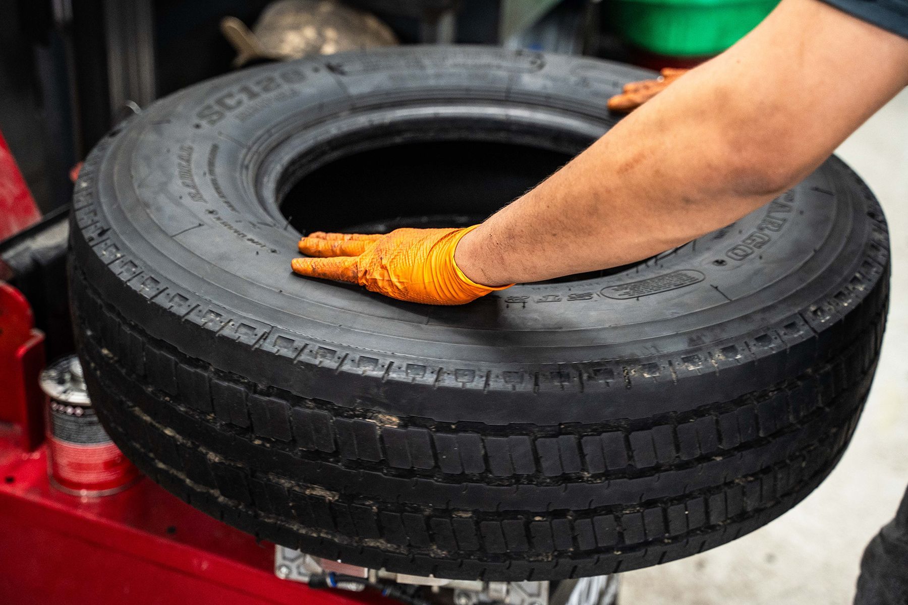 Working on Tire inside our Garage in Fishkill, NY | Jimmy's Auto Outlet