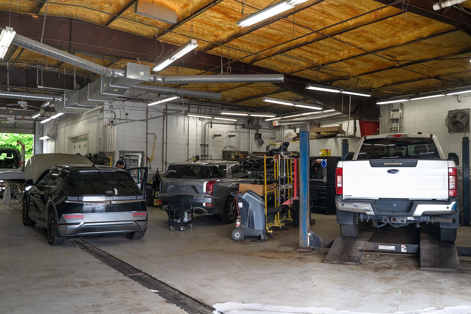Vehicles inside our garage in Fishkill, NY | Jimmy's Auto Outlet