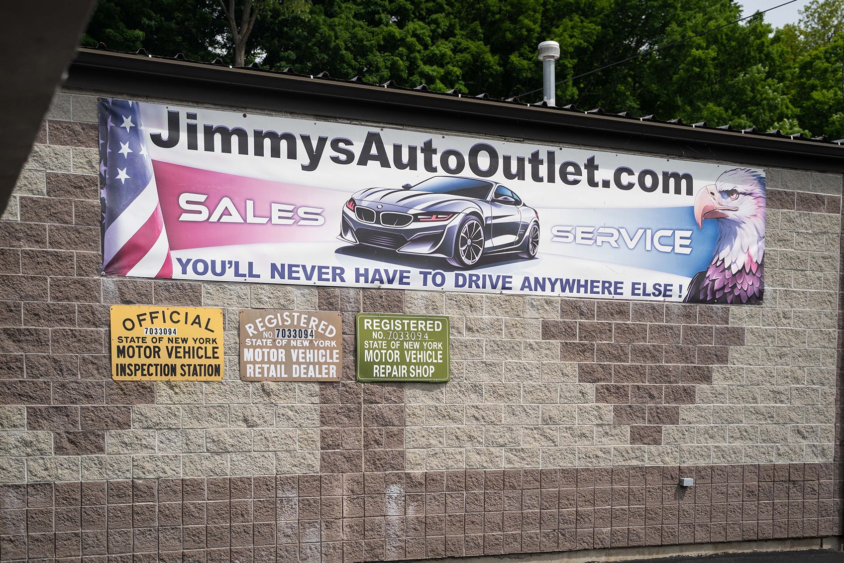 Signs outside of our shop in Fishkill, NY | Jimmy's Auto Outlet