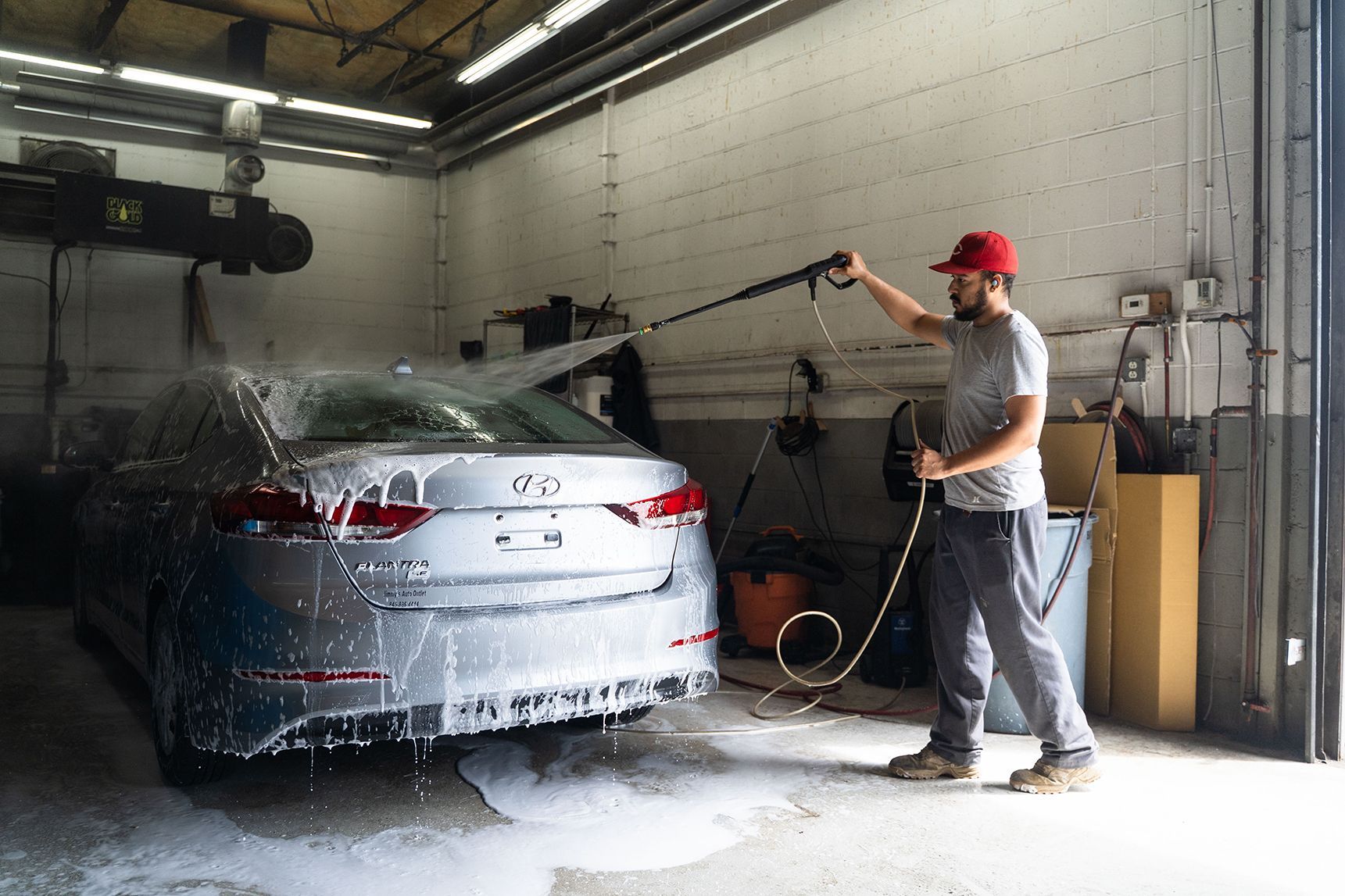 Car wash in progress inside our garage in Fishkill, NY | Jimmy's Auto Outlet