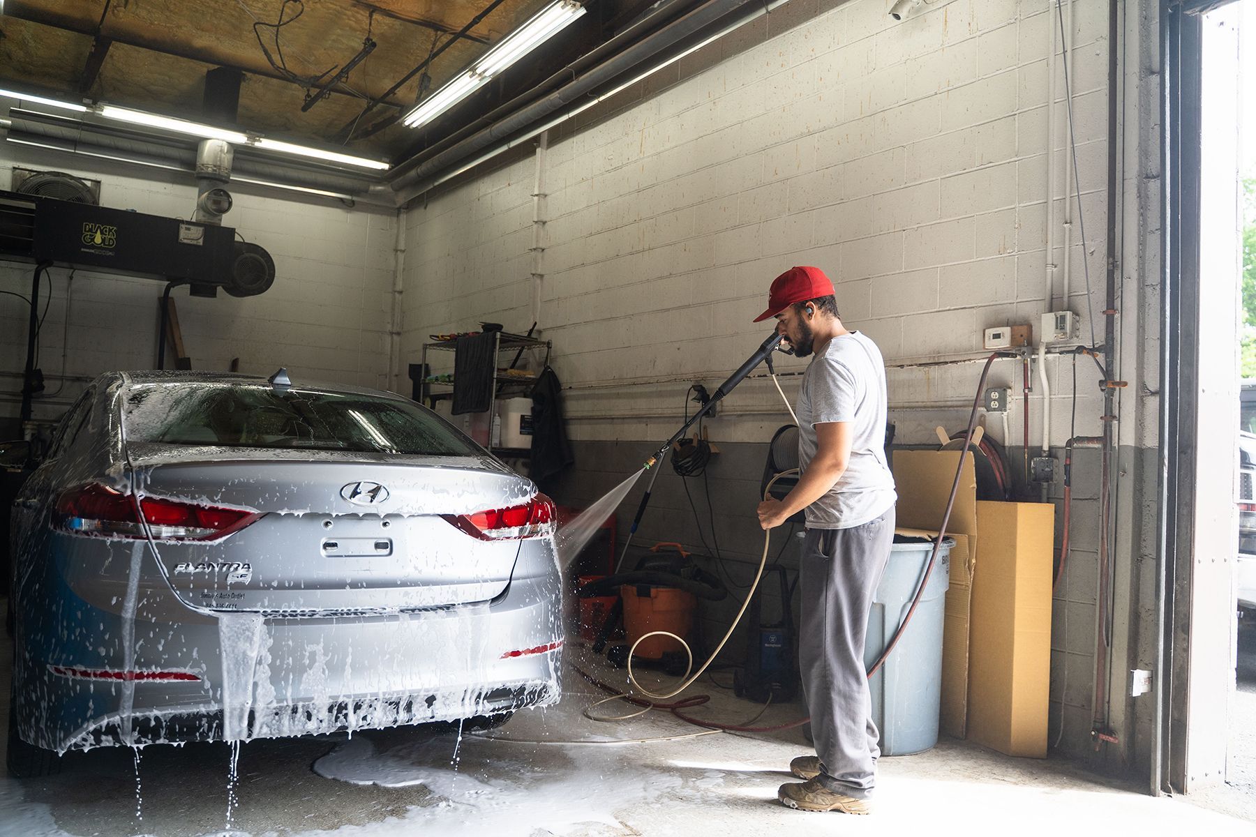 Car wash in progress inside our garage in Fishkill, NY | Jimmy's Auto Outlet