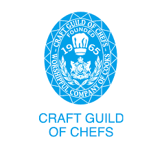 Blue emblem for Craft Guild of Chefs with text and a chef's hat.