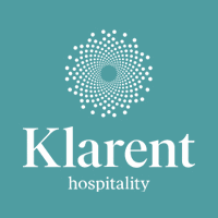 Logo for Klarent Hospitality, turquoise background, white text and dot pattern design.