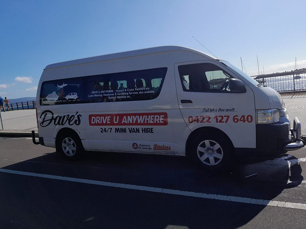 A White Van Is Parked in A Parking Lot — Daves Drive U Anywhere in Wollongong, NSW