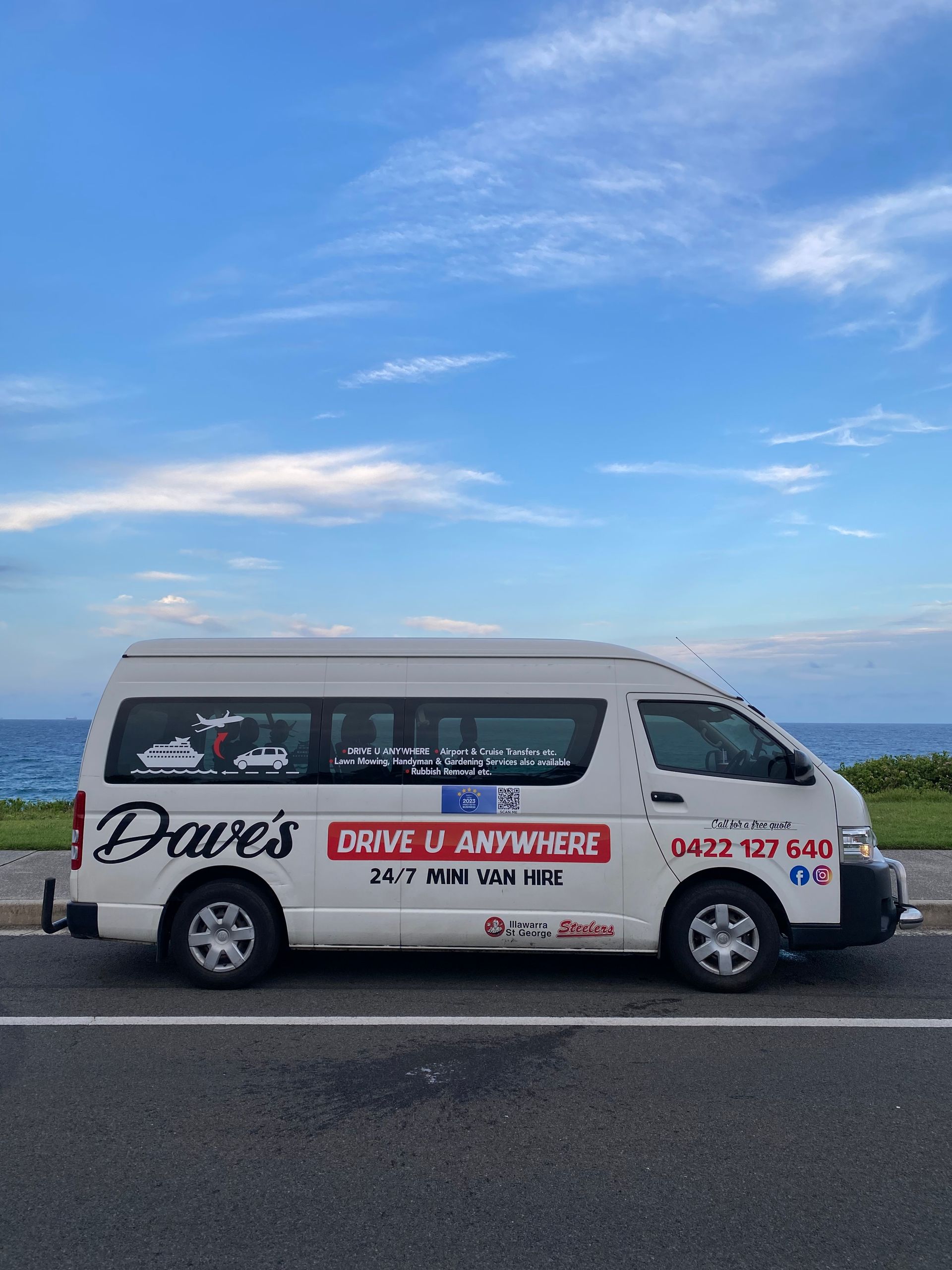 A White Van Is Parked on The Side of The Road — Daves Drive U Anywhere in Wollongong, NSW