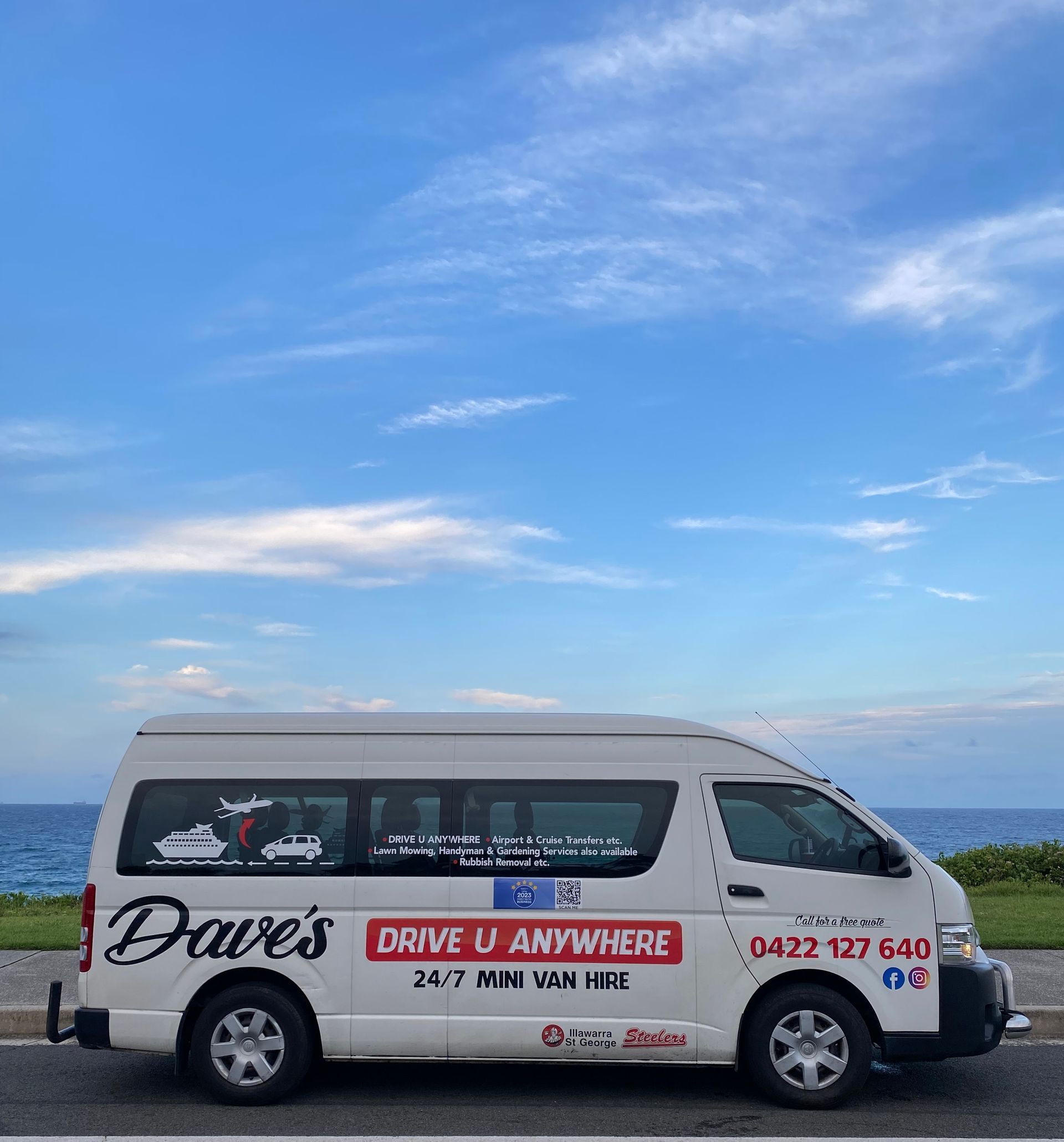 A White Van Is Parked on The Side of The Road — Daves Drive U Anywhere in Wollongong, NSW