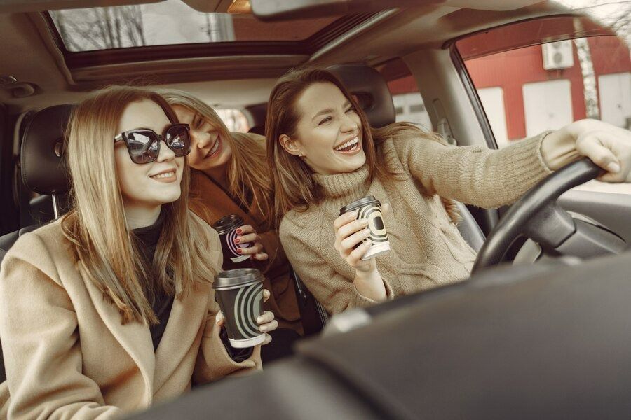 Three Women in a Car — Dave's Drive U Anywhere 24/7 Mini Van Hire In Wollongong, NSW