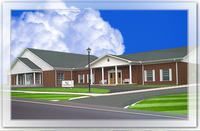 Brick school building with white trim and a covered entrance under a blue sky