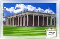 Modern building with white columns and green lawn under a blue sky; sign reads “Chapel Hill National Park”