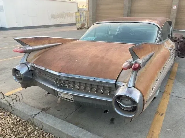 Car parked in a parking lot | Ed Hanson's Muffler Service
