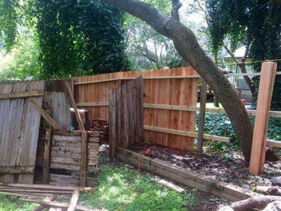 custom wood fence built around trees
