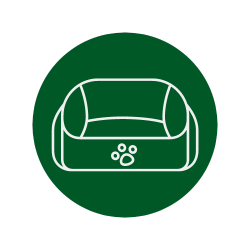Placa circular verde com desenho em linhas brancas de um sofá e patas de animais de estimação, indicando área de estar onde animais de estimação são permitidos.