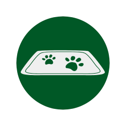 Placa circular verde com uma bandeja branca e duas pegadas verdes dentro.