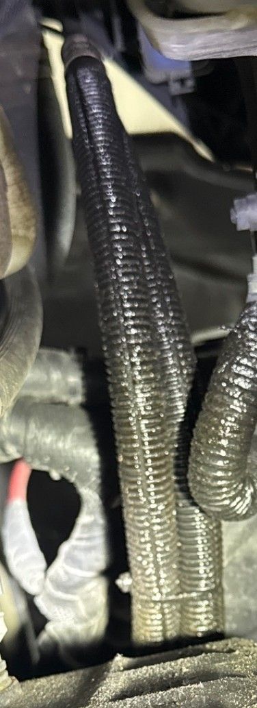 Transmission fluid leaking from a transmission cooler line