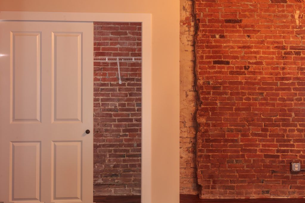 Exposed Brick and Mdern Amenities Are Available at Riverfront Lofts in Downtown Washington, MO.