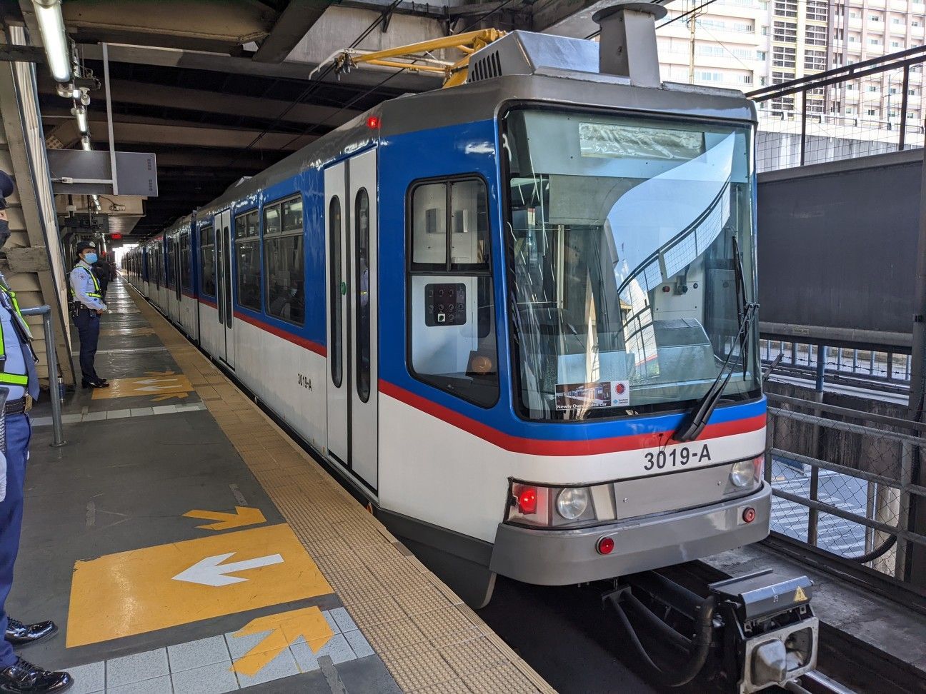 LRT Line 3 train 3019-A at Manila station platform near Makati CBD