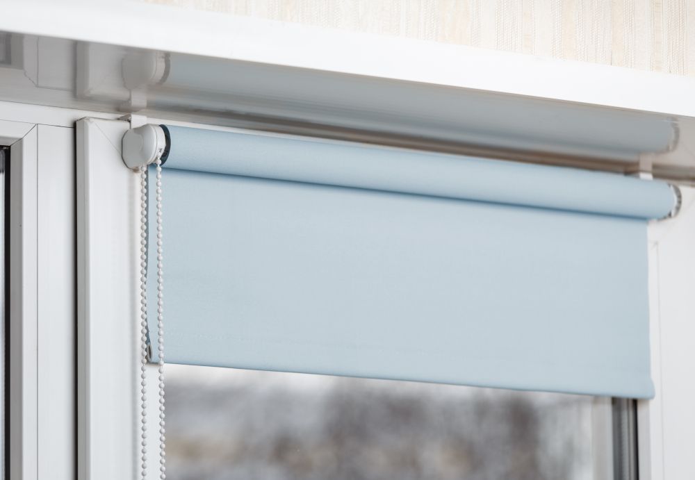 A Close Up of a Roller Blind on a Window — Curtain Haven & Blinds in Laurieton, NSW