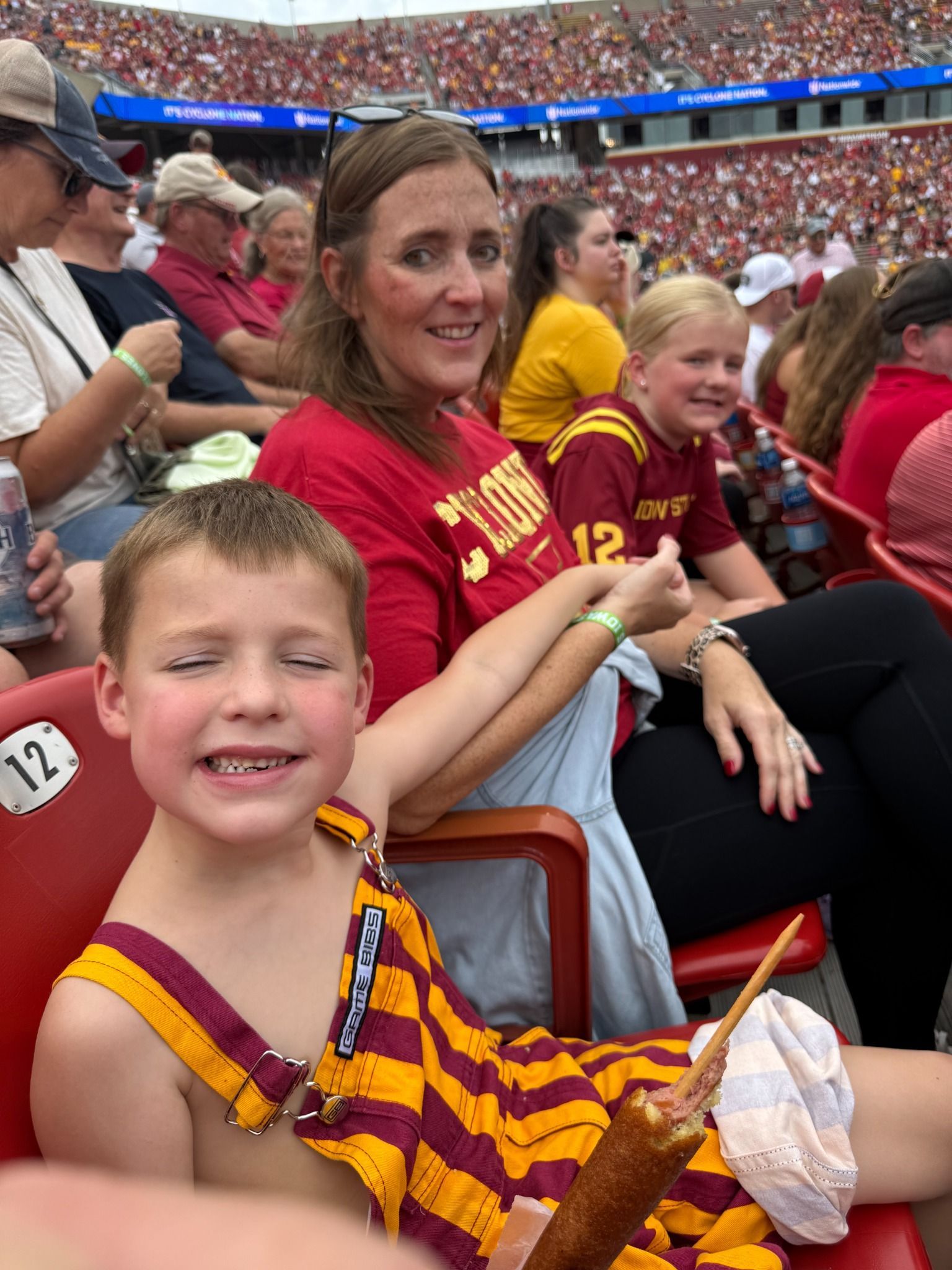 Mindy, Hadley, and Hudson in the stadium