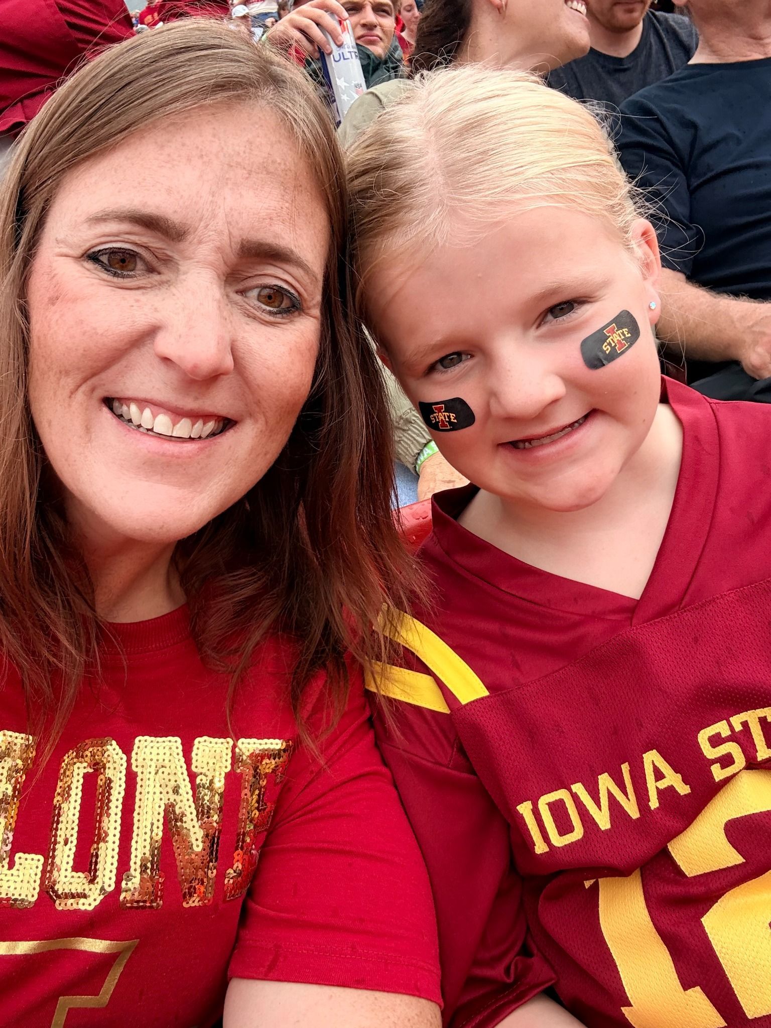 Mindy and Hadley at a football game