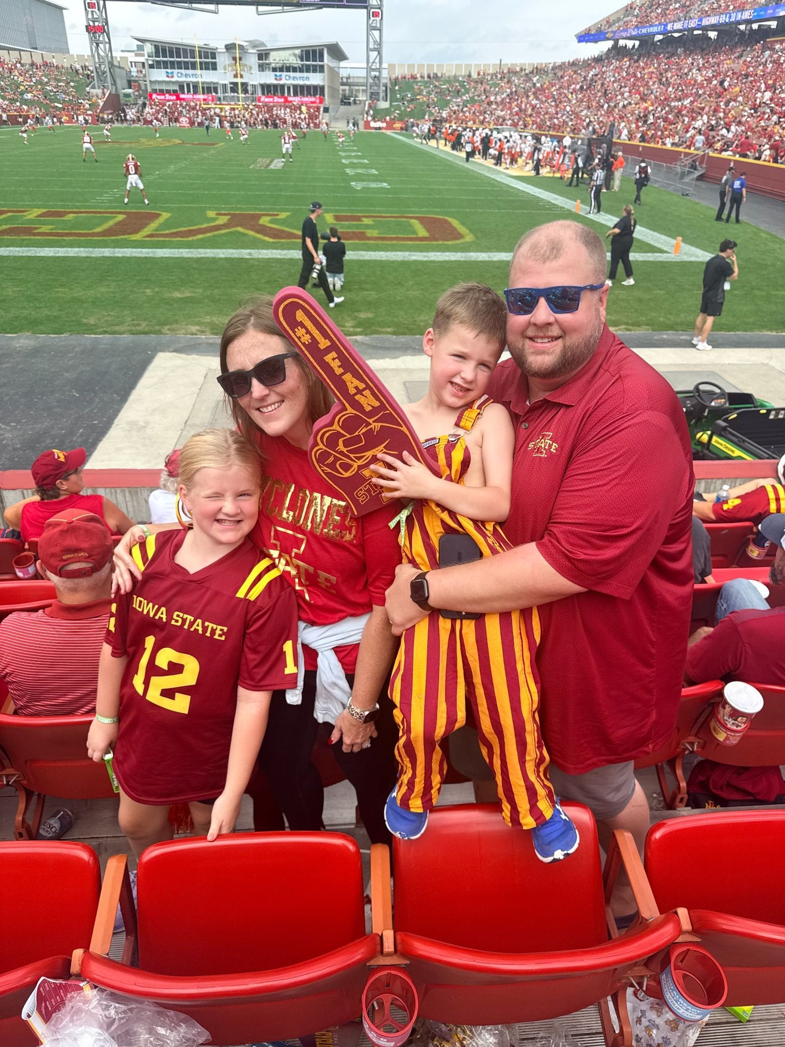 The Green family enjoying a football game together