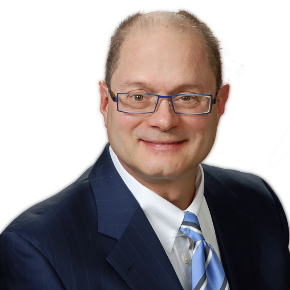 A man wearing glasses and a blue suit and tie
