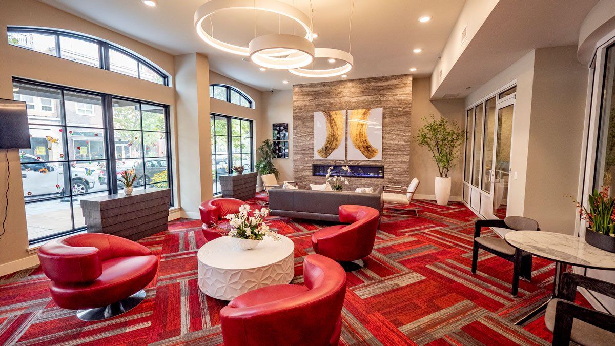 A room filled with furniture and a fireplace at Woodin Creek Village.
