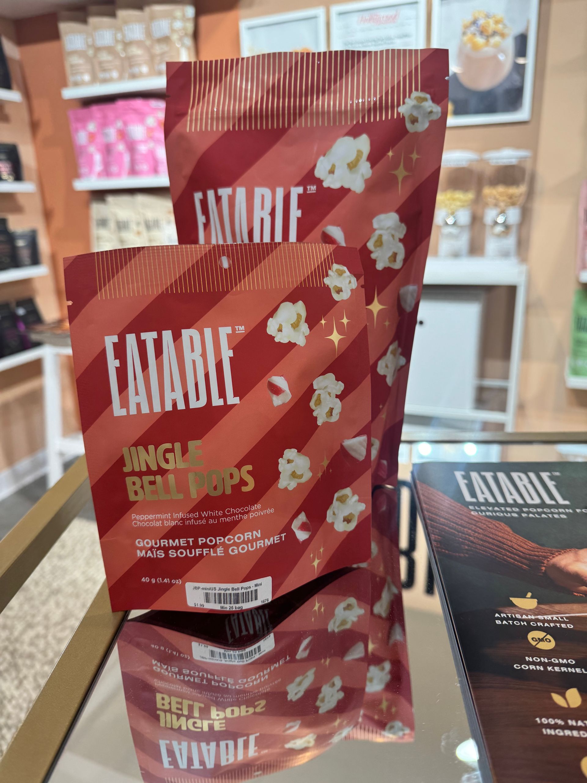 A bag of eatable popcorn sits on a counter