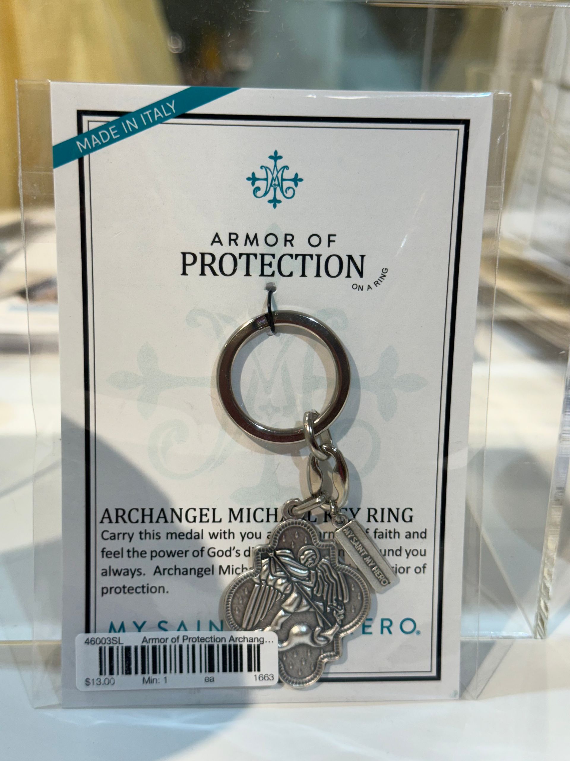 A keychain that says armor of protection on it
