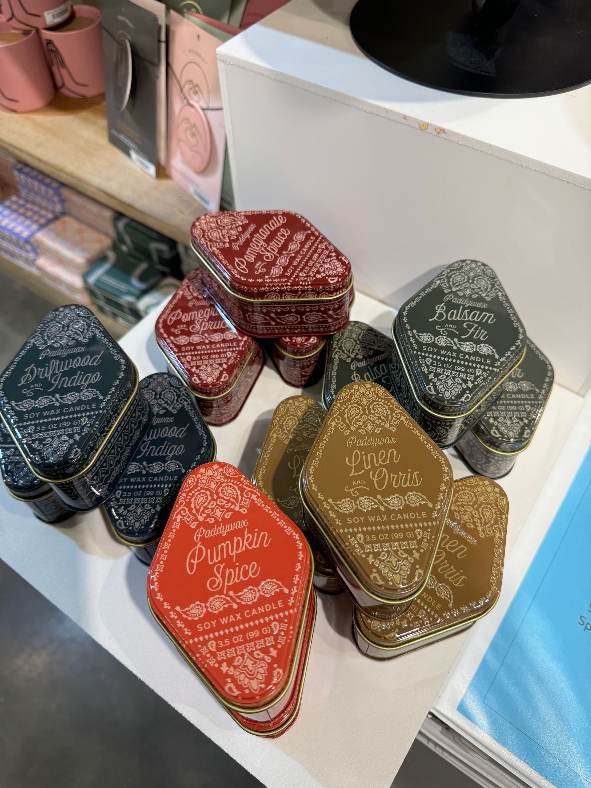 A stack of tins with one that says ' fleurs ' on it