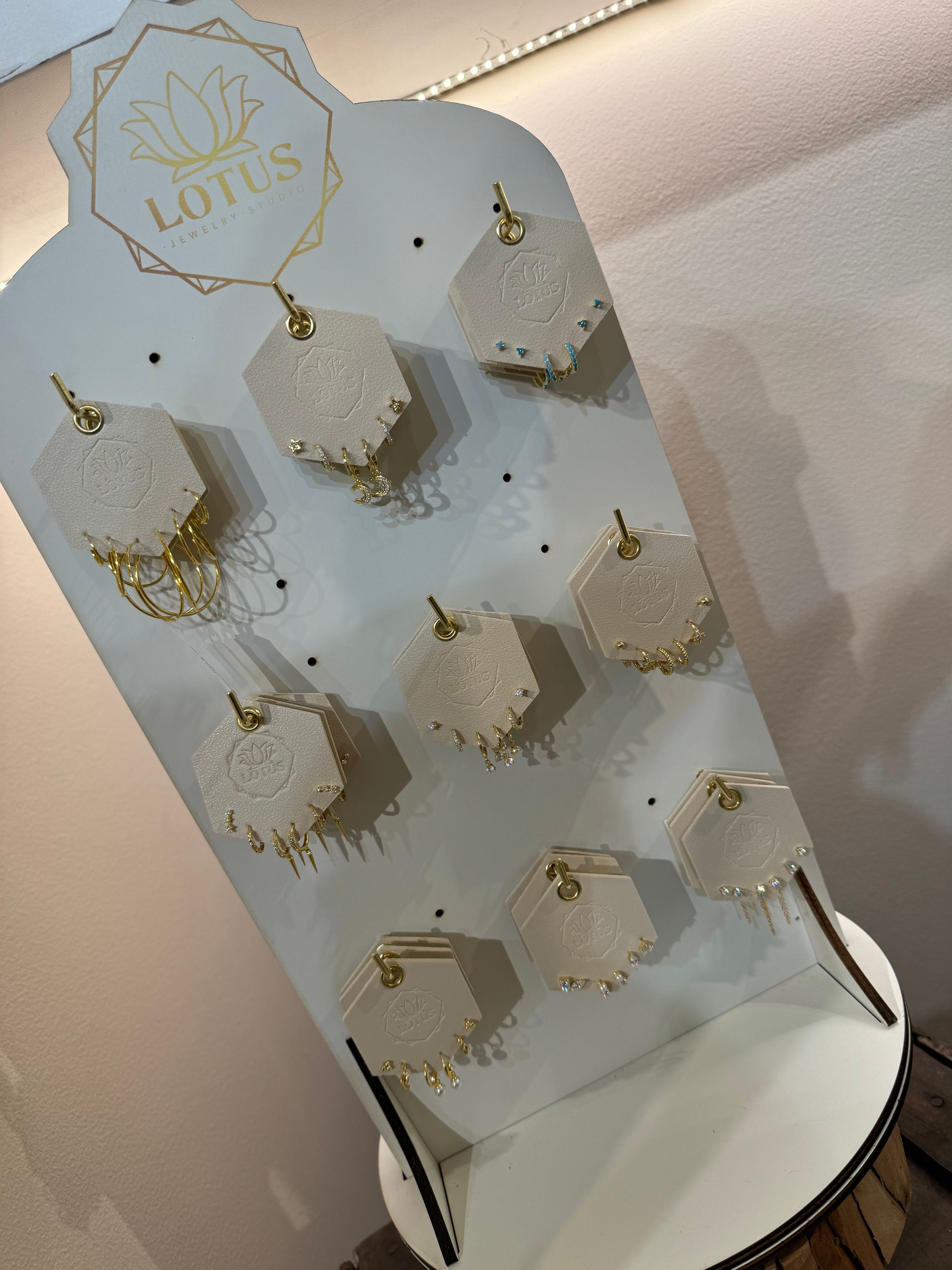 A white display with a lotus logo on it