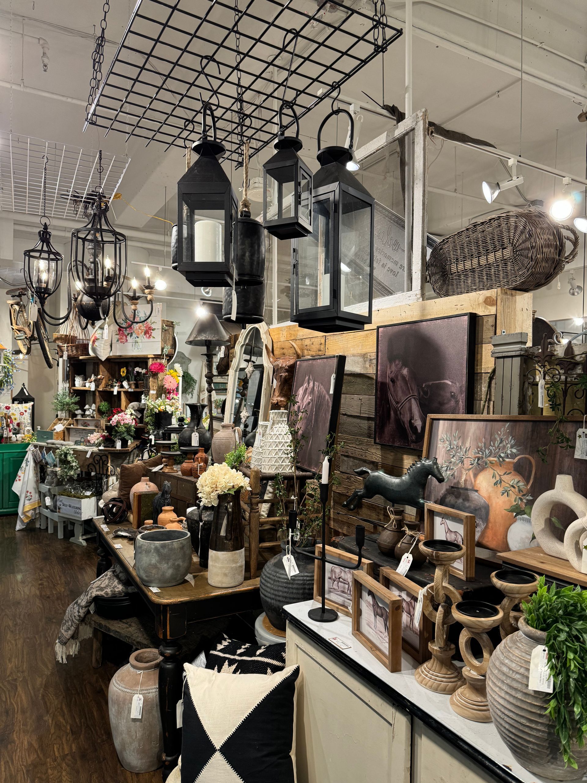 A store filled with lots of lanterns and vases