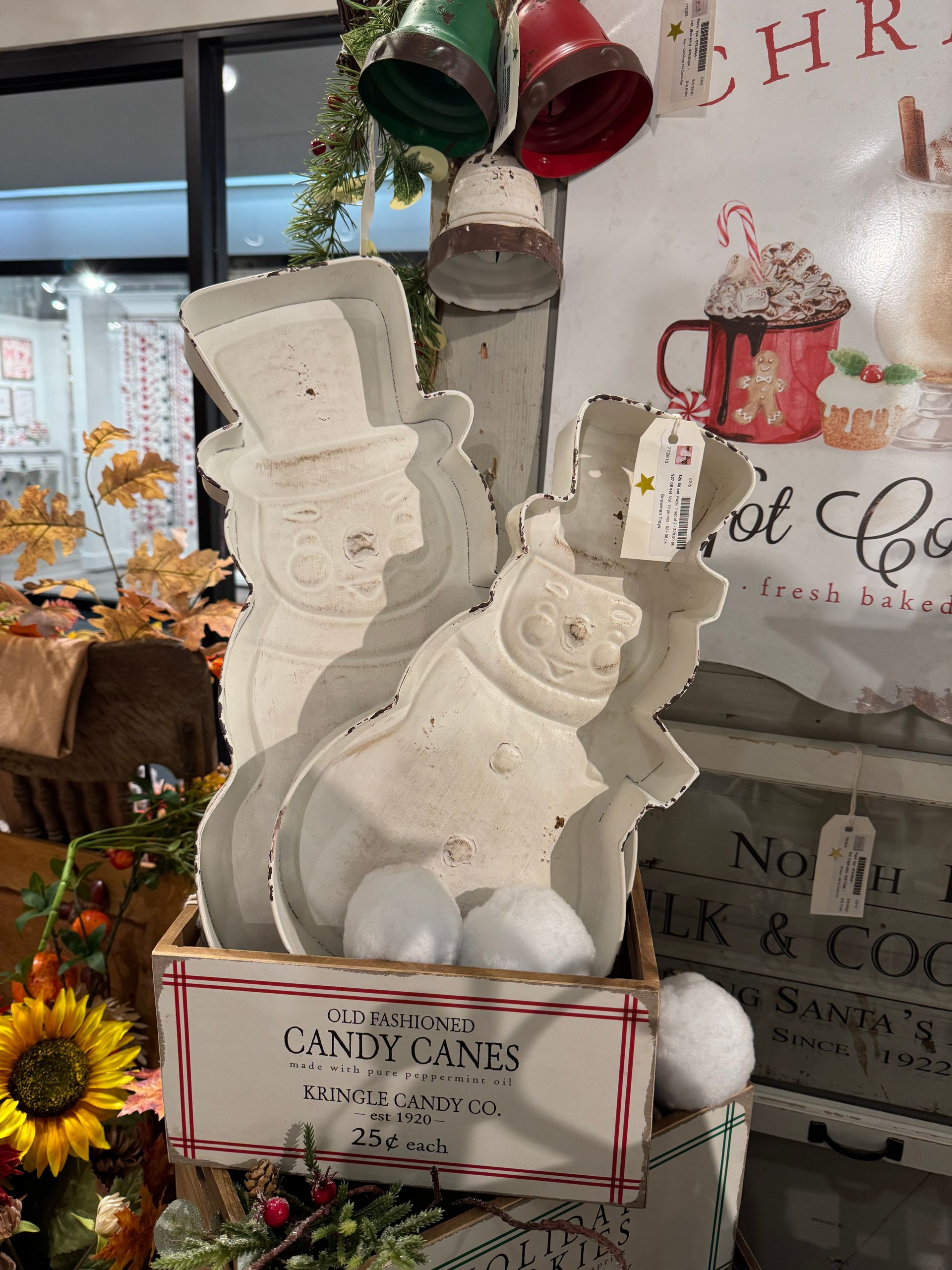 A box of candy canes sits on a table