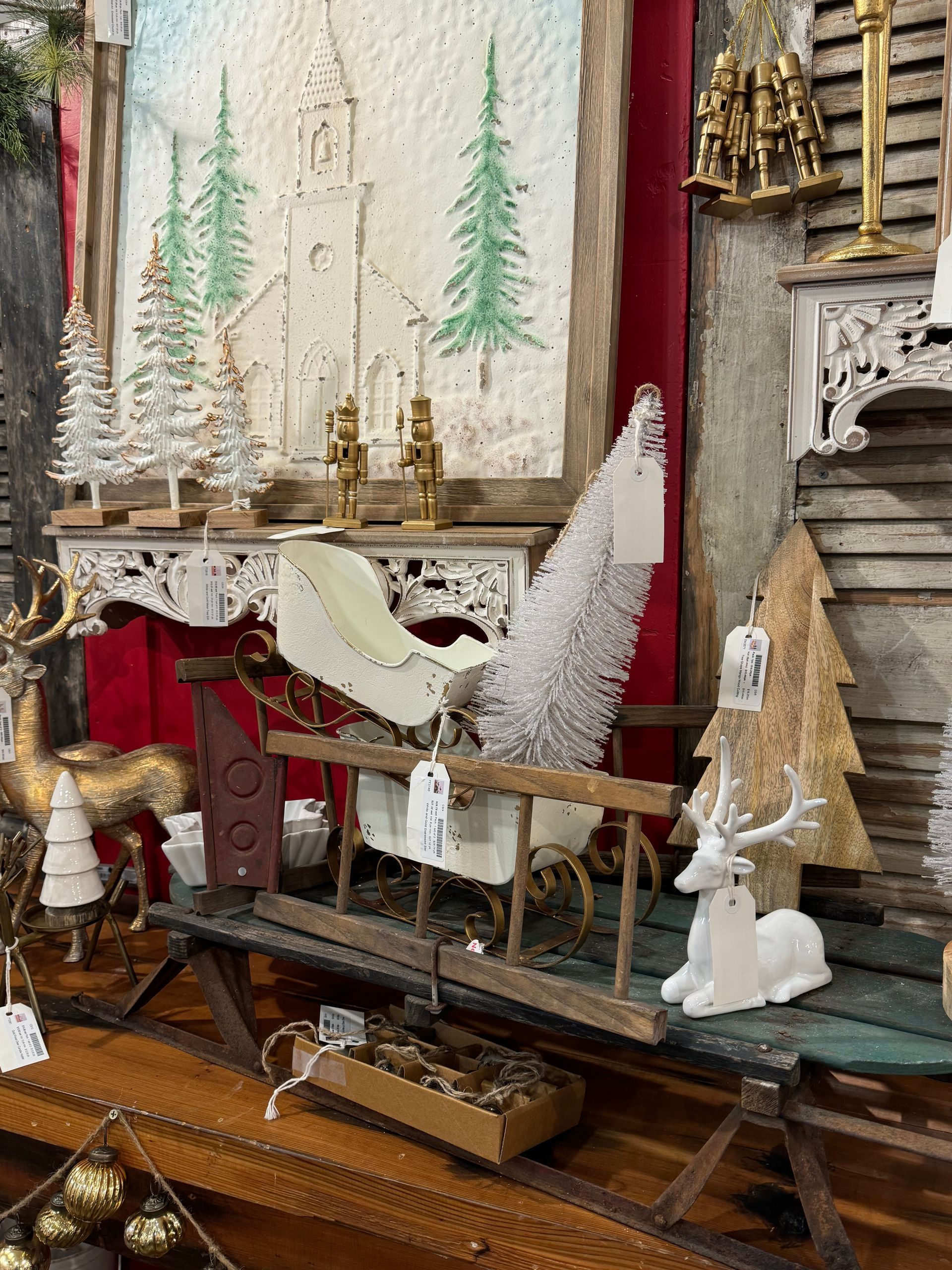 A bunch of christmas decorations are sitting on a table