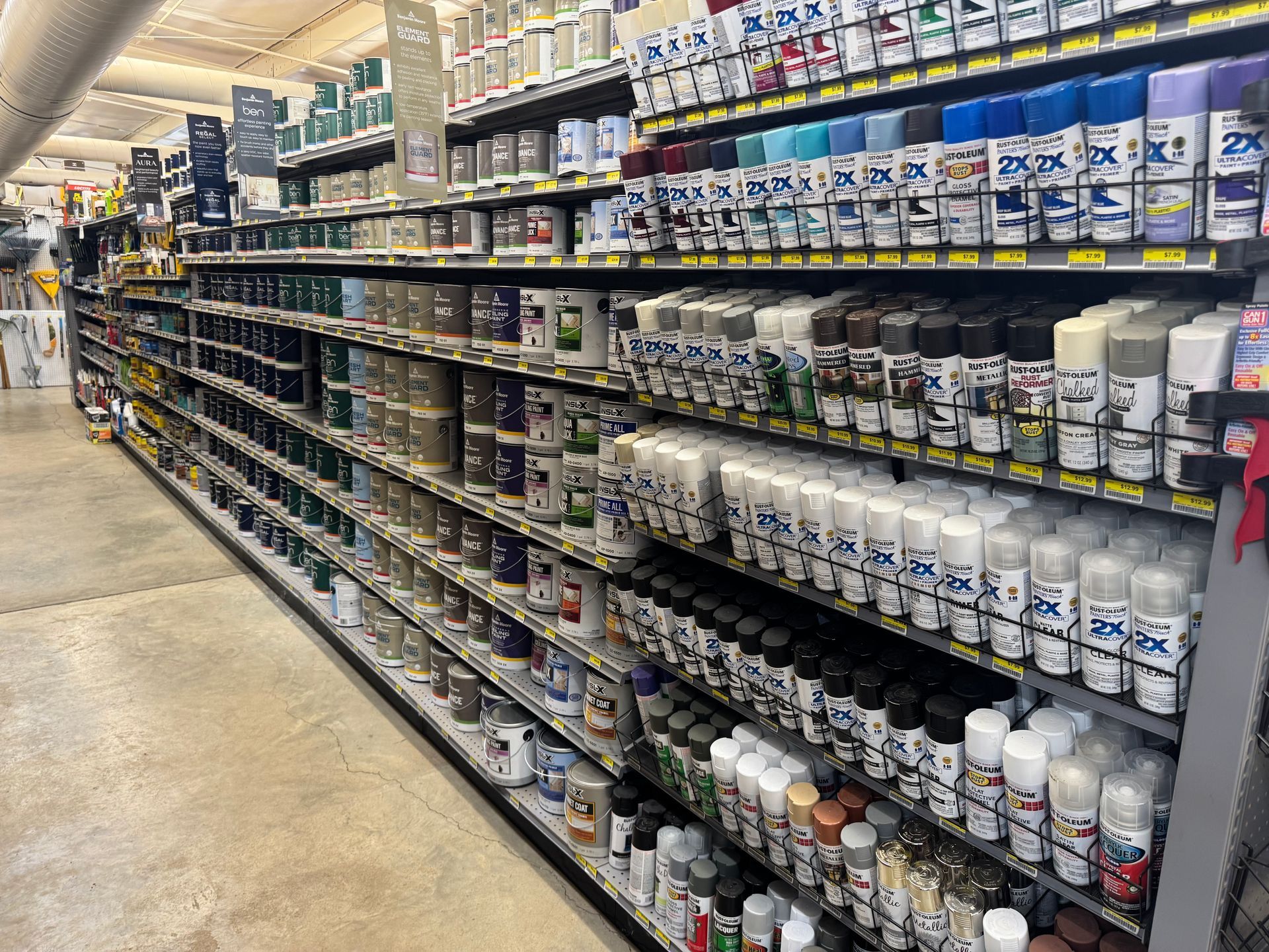 White paint in a tray, next to a textured black section.