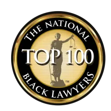 The national top 100 black lawyers logo with a statue of justice holding scales of justice.
