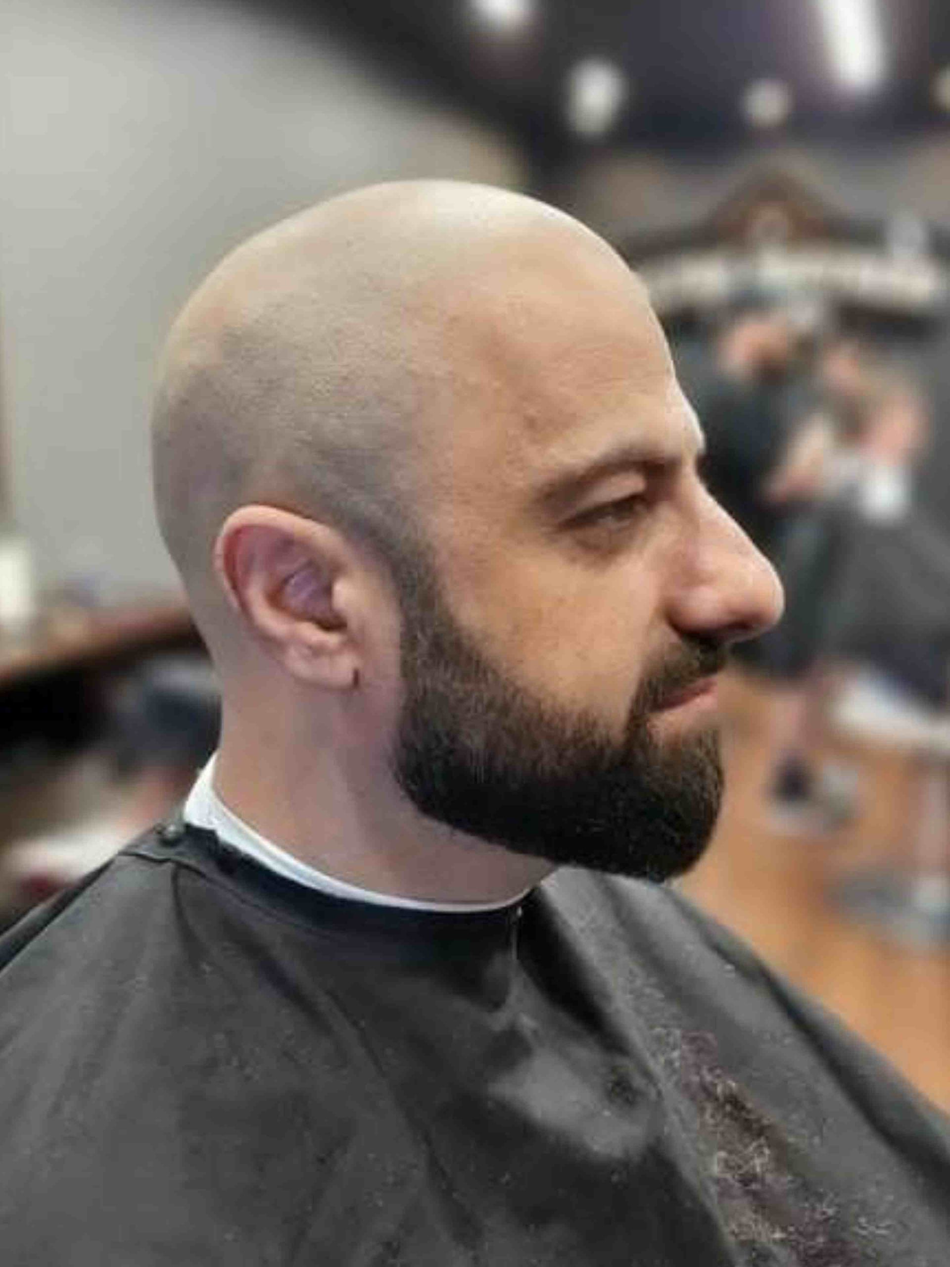 Man With Shaved Head And Trimmed Beard — Bolton Brothers Barbers in Erina, NSW