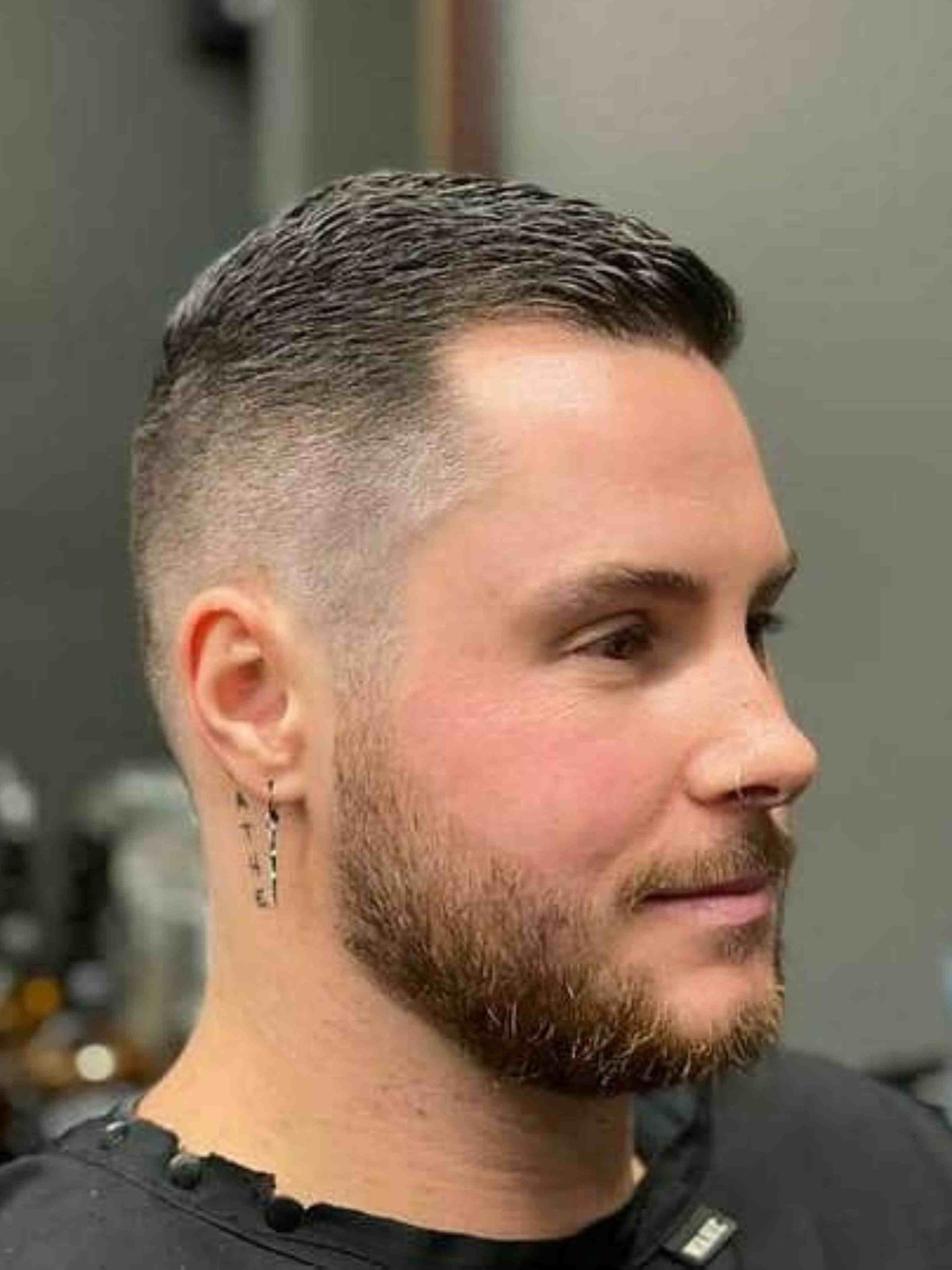 Man With Short Dark Hair And Fade Wearing Earrings — Bolton Brothers Barbers in Erina, NSW