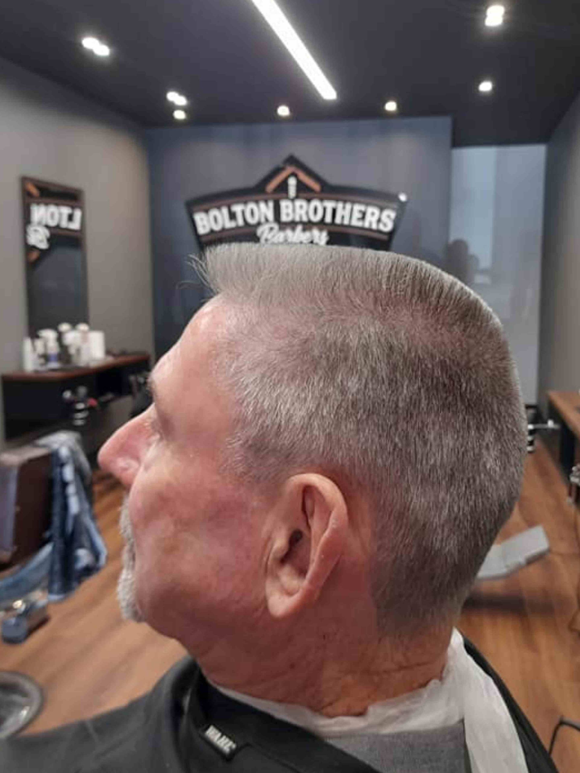 Man With Gray Flattop Haircut In Barbershop — Bolton Brothers Barbers in Erina, NSW