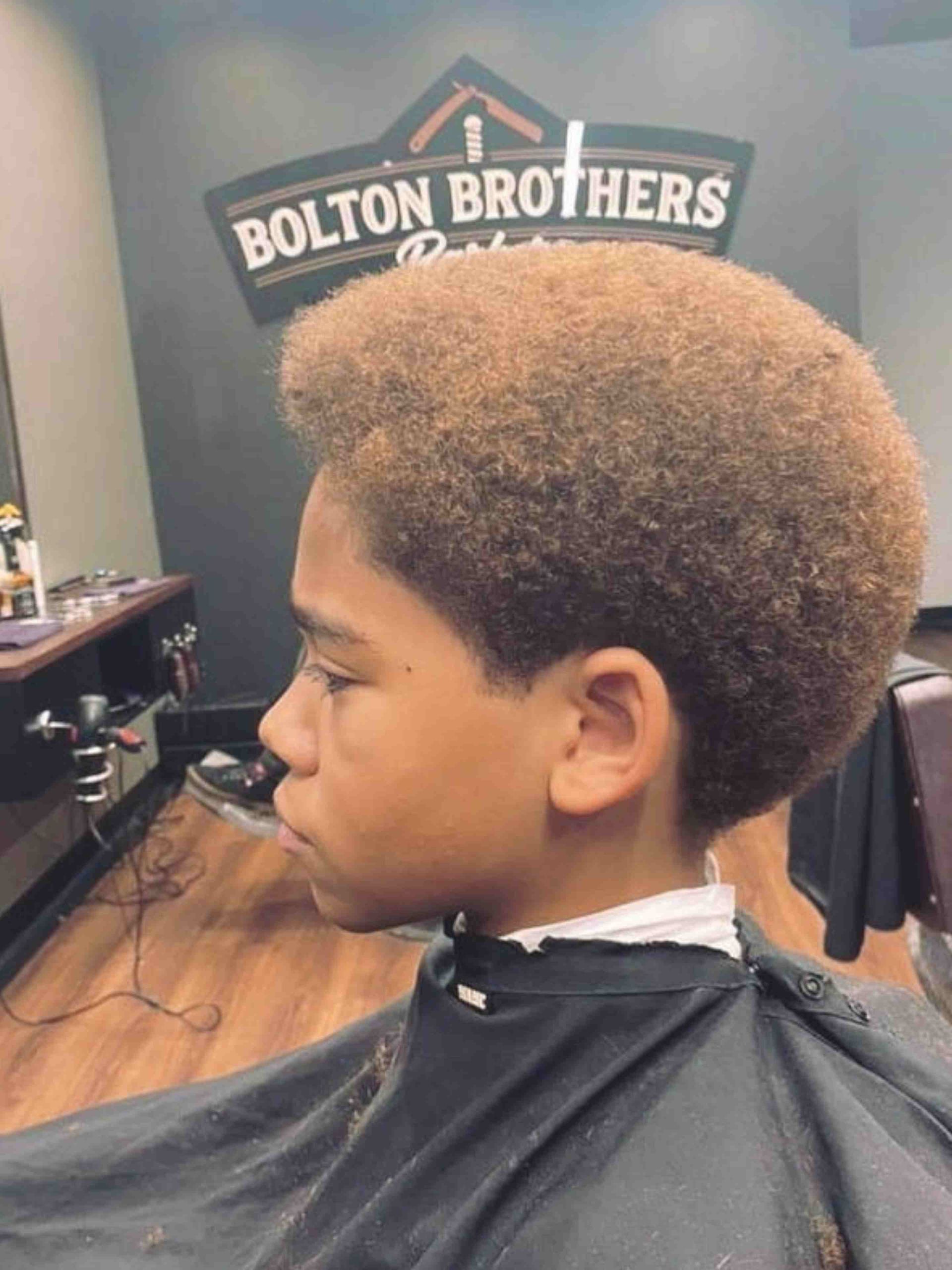 Boy With Light Brown Afro — Bolton Brothers Barbers in Erina, NSW