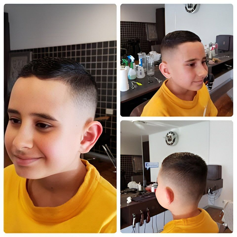 Boy With Fresh Fade Haircut Smiling — Bolton Brothers Barbers in Erina, NSW