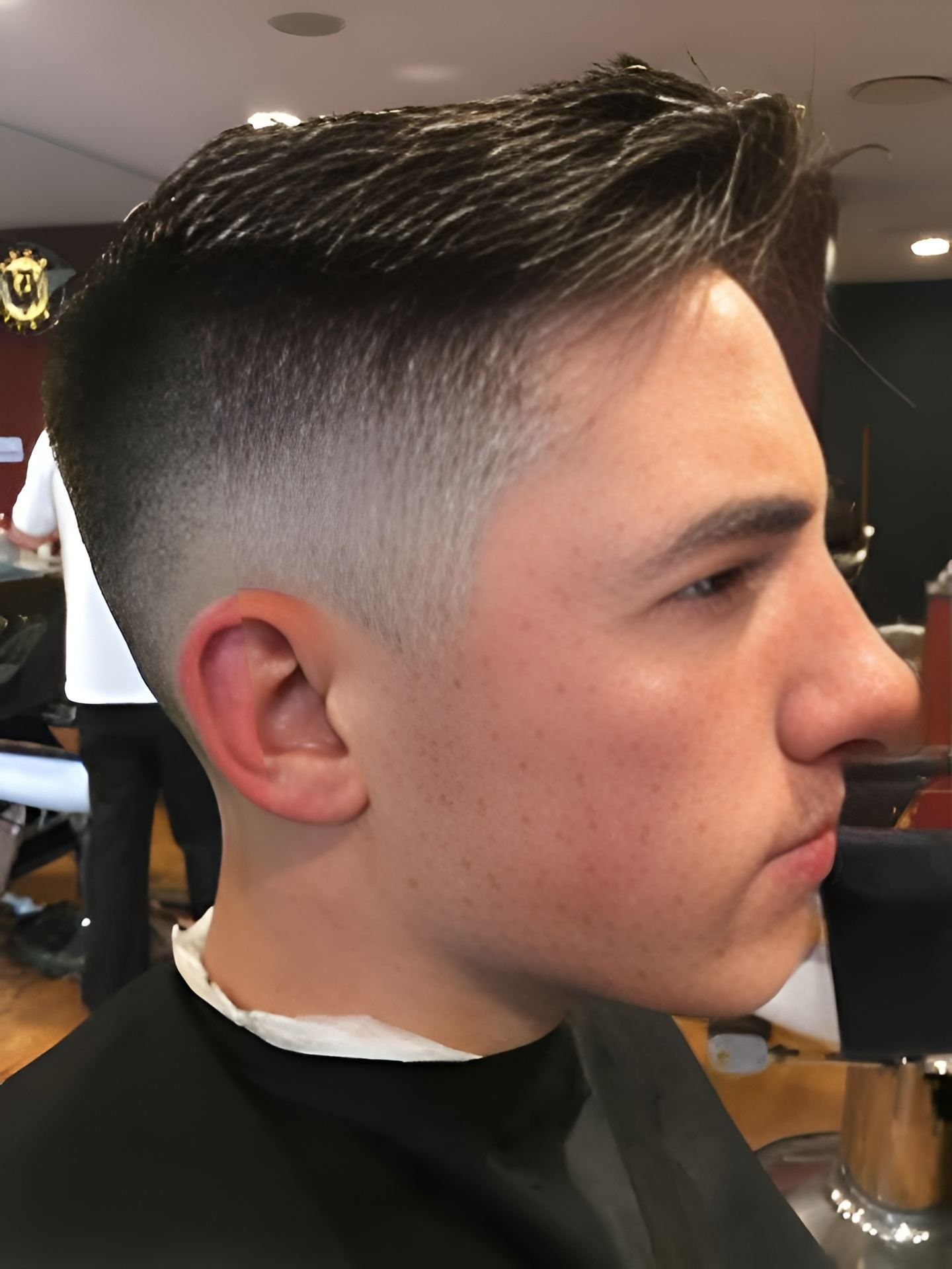 Man With Faded Haircut In Side Profile β Bolton Brothers Barbers in Erina, NSW