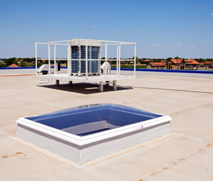 There is a skylight on the roof of a building.