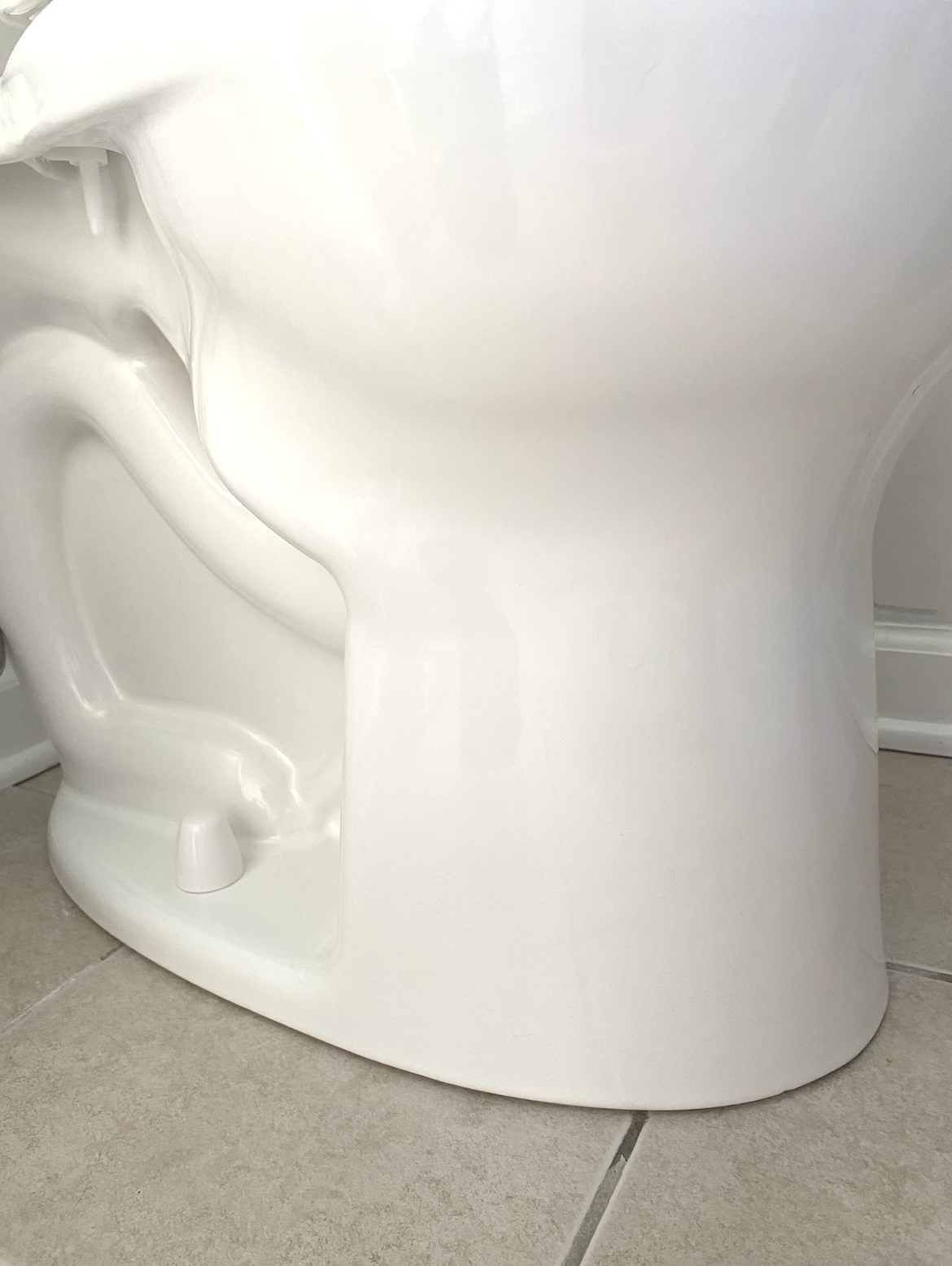 BOTTOM OF TOILET BOTTOM OF TOILET