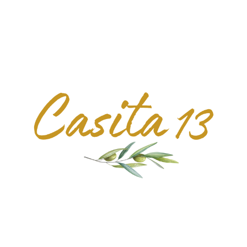 Casita 13 logo with gold text and olive branch.