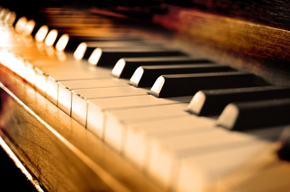 A Close Up of a Piano Keyboard With the Keys Lit Up — Ocean Grove Removals In Whittington, VIC