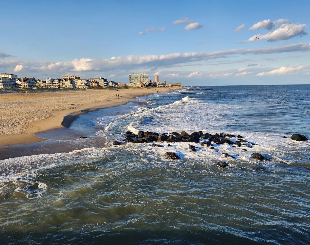 A Beach With a City in the Background — Ocean Grove Removals In Ocean Grove, VIC