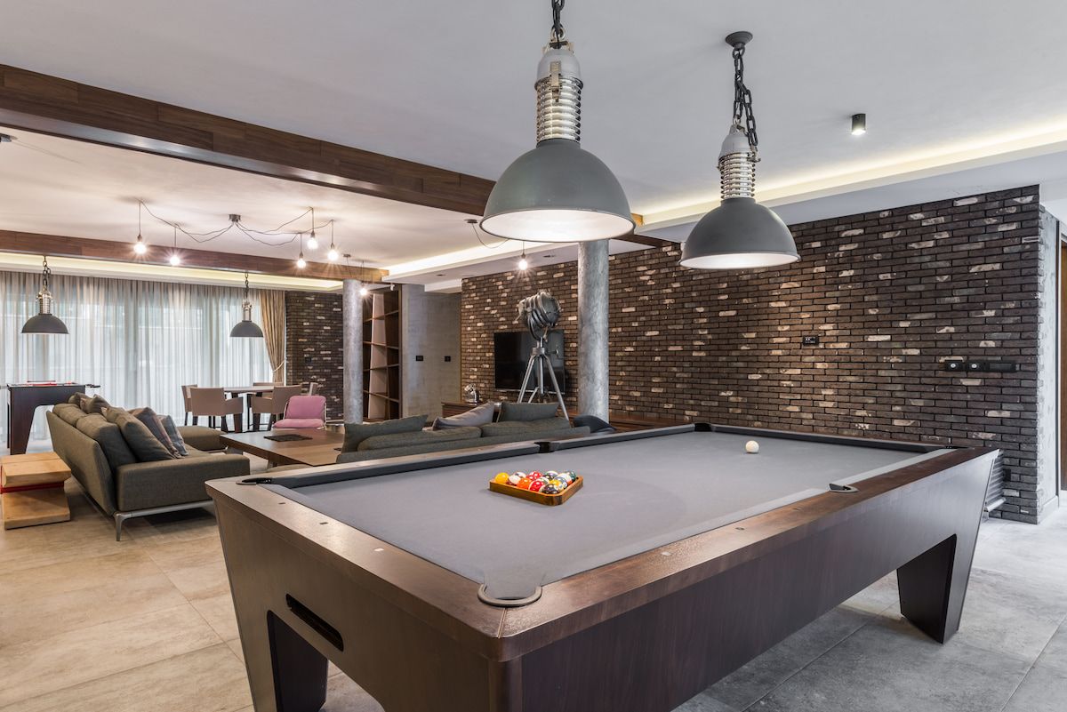 There is a Pool Table in the Middle of the Living Room — Ocean Grove Removals In Whittington, VIC