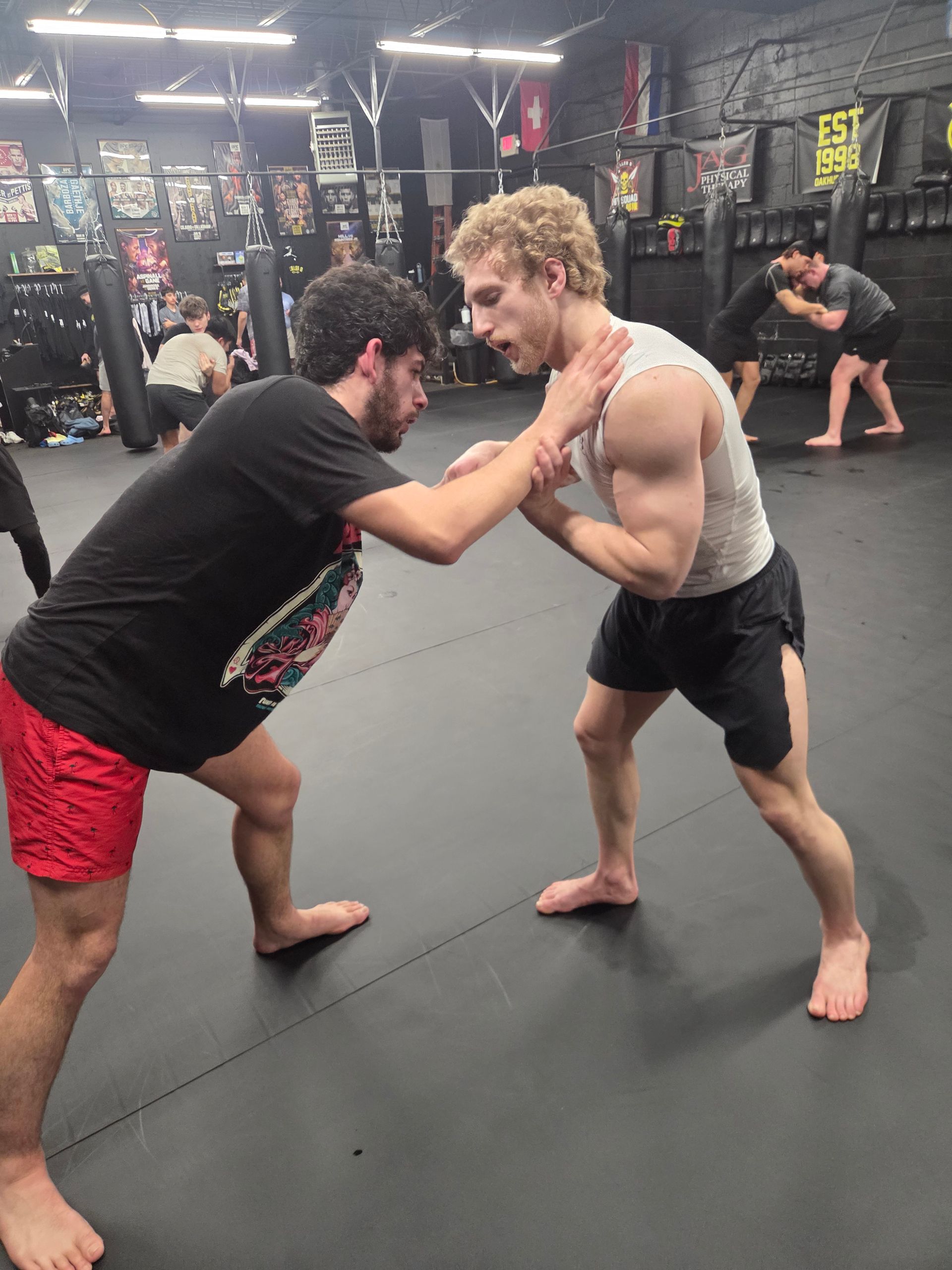 Adults training striking and conditioning at Killer B Combat Academy in Oakhurst, NJ.