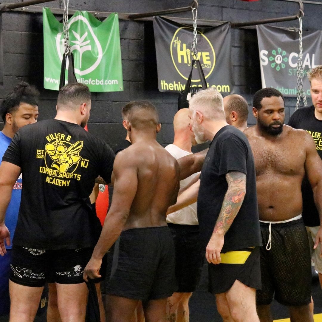 Students training together at Killer B Combat Academy in Oakhurst, NJ, building fitness, trust, and friendships.